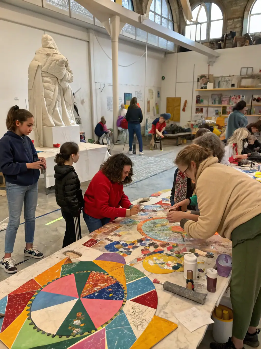 A vibrant image of a community art workshop facilitated by CHUKCHUKA, highlighting the collaborative and inclusive nature of the program.